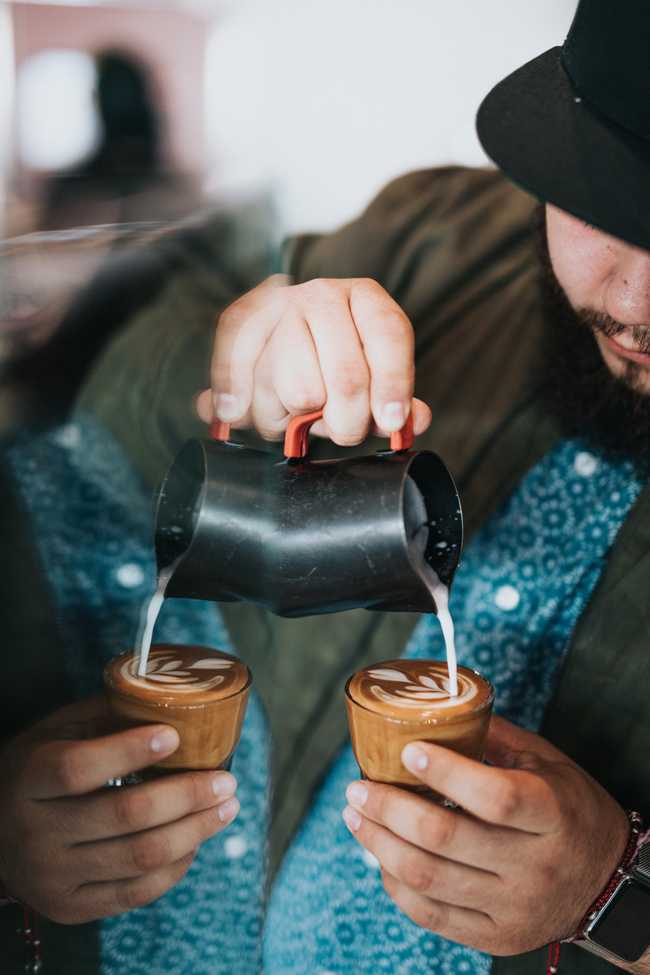 two drinks poured at the same time in mirror